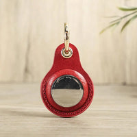 Buy Apple AirTag protective cover first layer cowhide pet anti-lost keychain positioning tracker leather case at Caseles-lea-atag-brown, 